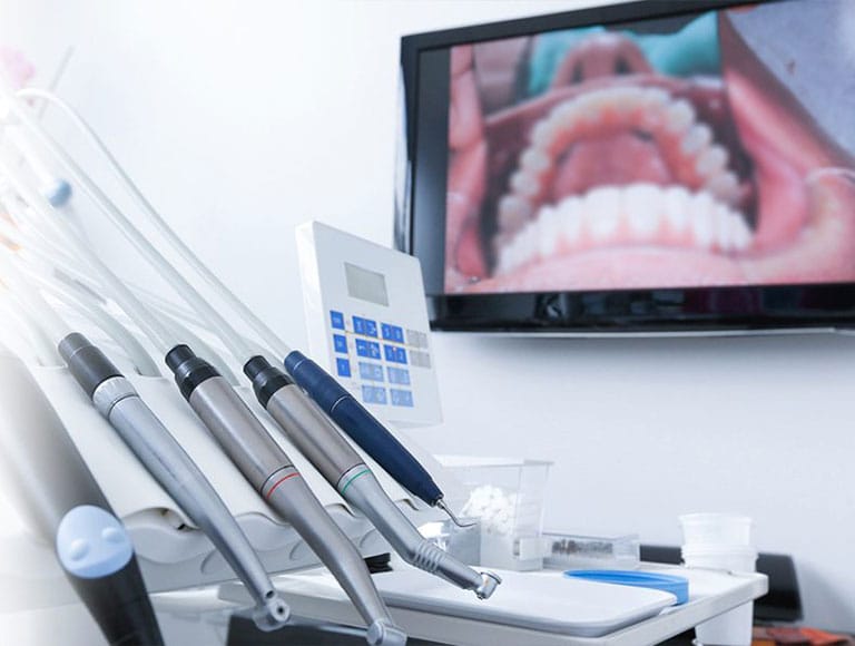 Operatory with intraoral scanning equipment and chairside monitor